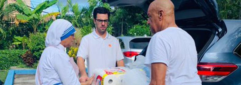 EFL staff passing out food