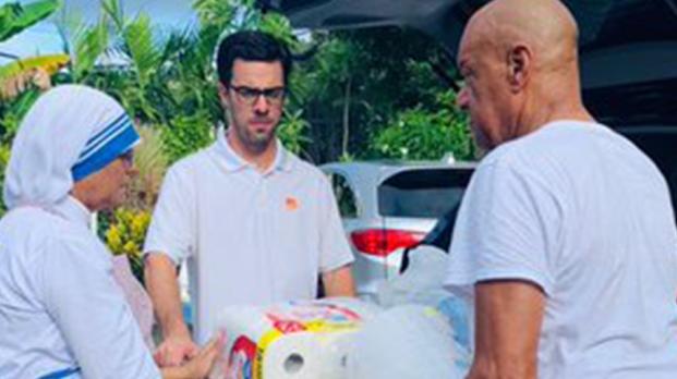 EFL staff passing out food