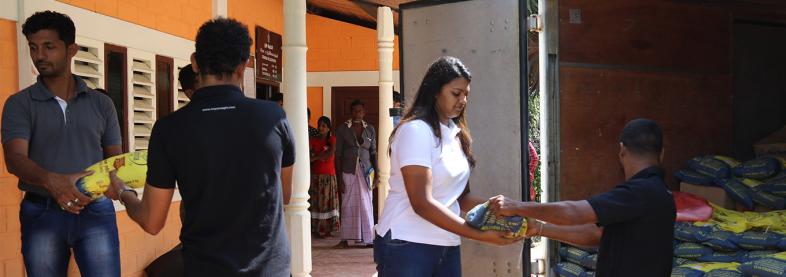 EFL staff unloading donations